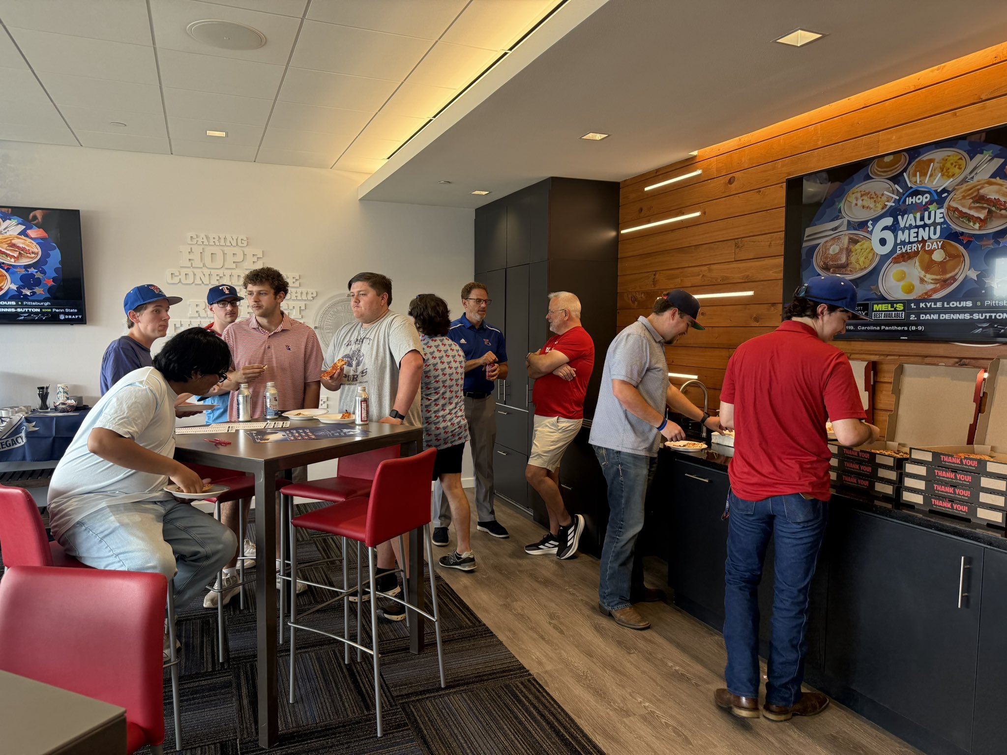 Blue Bloods members in a premium suite experience